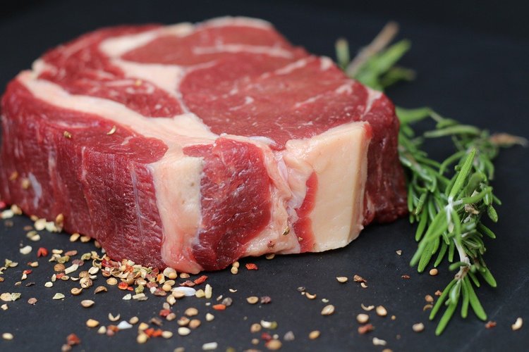 DeBruycker Charolais Meats tenderloin beef steak and rosemary sprig